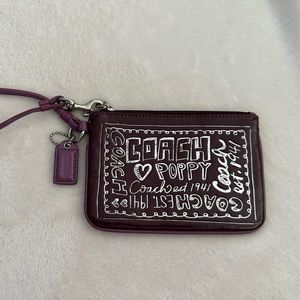 Small purple Coach Poppy wristlet